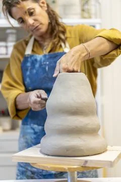A dedicated ceramist at work Stock Photos