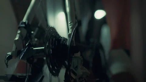 A dedicated cyclist is pushing his limits as he pedals hard on an advanced t Stock Footage 281088628