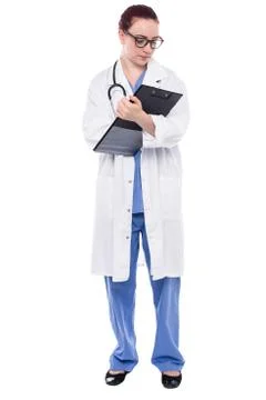 Dedicated doctor taking notes Stock Photos
