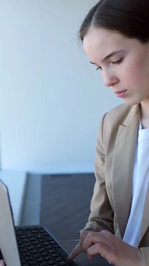 Dedicated Employee Using Portable Computer Conducts Remote Corporate Stock Footage 346730076
