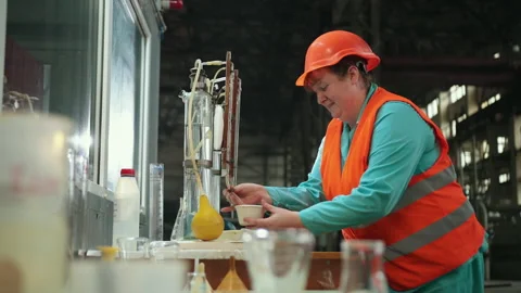 Dedicated female chemist creating an innovative and efficient substance work Stock Footage 145993209