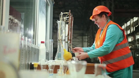 Dedicated female chemist creating an innovative and efficient substance work Stock Footage 150487942