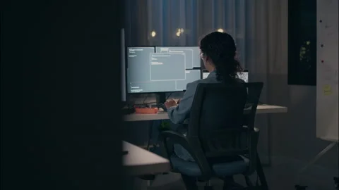 Dedicated Female Engineer Working Late on Robotics Code. Stock Footage 307586765