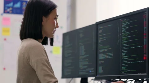 Dedicated Female Programmer Debugging Code. Stock Footage 273192496
