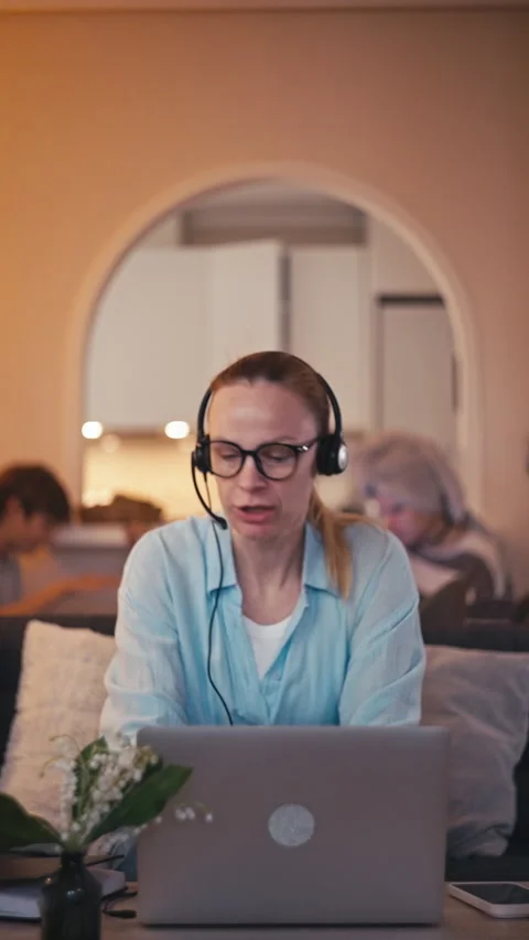 Dedicated female telemarketer working from cozy home office, multitasking o.. Stock Footage 329131672