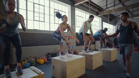Dedicated people doing box jumps Stock Footage 71618518