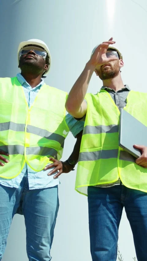 Dedicated professionals wearing safety gear are essential at any construction Stock Footage 314206545