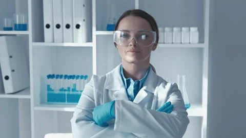 A dedicated scientist is diligently working in a lab, showcasing commitment to 스톡 동영상 317022424