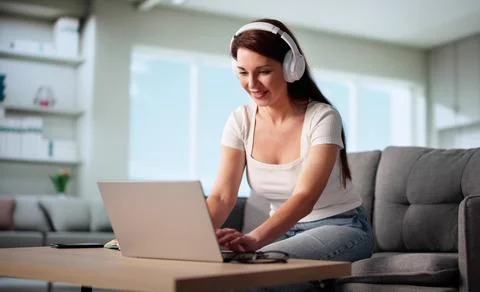 Dedicated Student Engaged In Virtual Classroom For Distance Learning Online. 写真素材