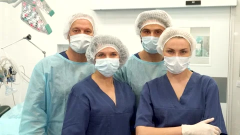 Dedicated surgical team ready for action in the operating room Stock Footage 311942435
