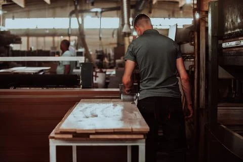 A dedicated worker in the woodworking industry Stock Photos