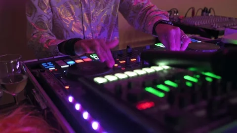 The deejay in the console who mixes during the evening Stock Footage 222552774