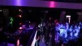 Deejay, security guard working at night club, people dancing HD Footage