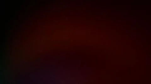 Deep 4K abstract grainy backdrop with black dark red and purple gradient hues Stock Illustration