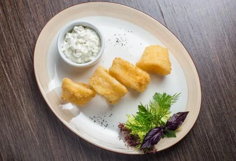 Deep batter fried squid rings calamari Stock Photos