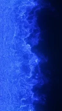 Deep blue abstract texture mimics a glowing coastline or electric wave crashi Stock Photos