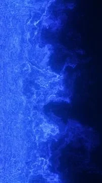 Deep blue abstract texture mimics a glowing coastline or electric wave crashi Stockfoto's