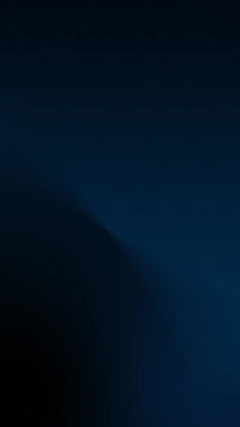Deep blue and black abstract gradient, seamless loop background. 4K. Vídeo Stock 309956950