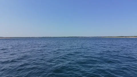 Deep blue Atlantic Ocean water rippling waves on calm ocean surface 스톡 동영상 345136238
