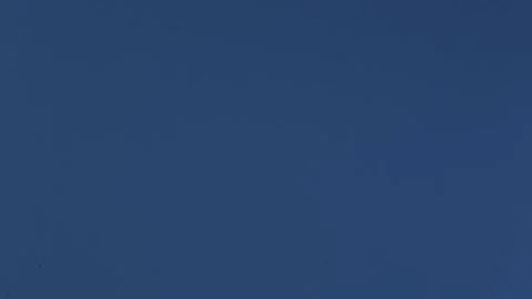 Deep blue clear sky background with soft daylight view Stock Footage 318971079
