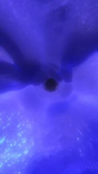 Deep blue clouds and particles converge into a dark central vortex, creatin.. Stock Illustration