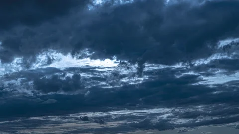 The deep blue clouds stream in the evening sky. time lapse Stock Footage 131463635