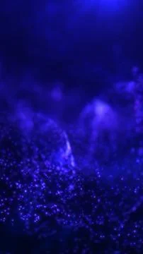 Deep blue cosmic particle field with glowing dots and atmospheric depth, fo.. Illustrazione stock