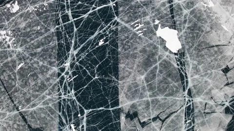 Deep Blue Cracked Ice. Perspective Aerial View. Frozen Texture of Baikal Lake in Stock Footage 150852005
