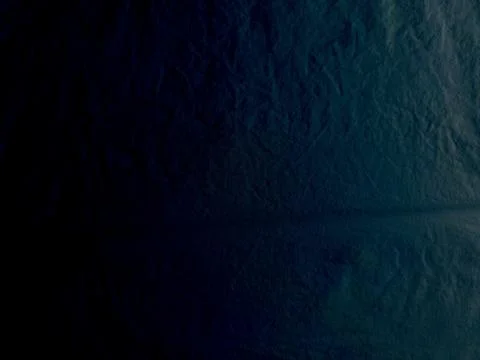 Deep blue crumpled fabric texture closeup captures dramatic folds mysterious  Stock Photos