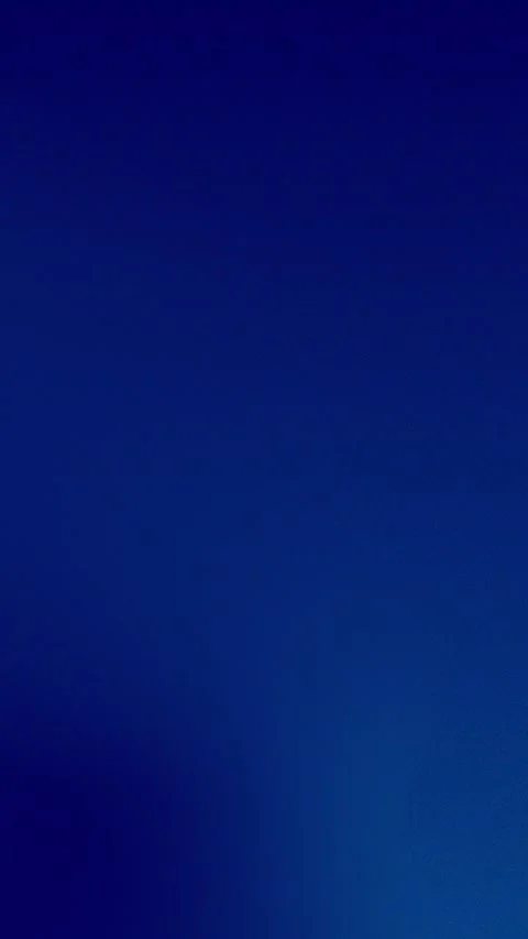 Deep blue gradient background with smooth transition. Seamless loop. 4K. Stock Footage 309701652