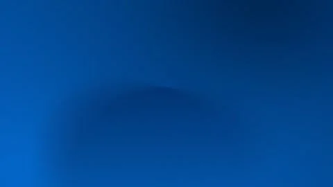 Deep blue gradient with soft shadow, seamless loop background. 4K. Vídeos de archivo 309700744