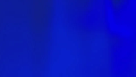 Deep blue gradient swirls softly across the frame 動画素材 333264899