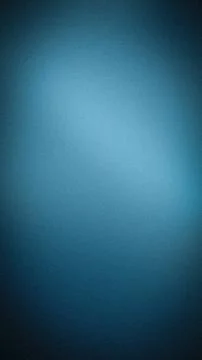 Deep blue grainy gradient background with soft light and elegant dark vignett Stock Photos