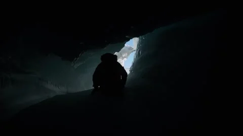 Deep blue ice cave inside Glacier, Antarctica. A dramatic symbol of climate Stock Footage 322519623