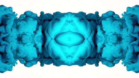 Deep blue ink spreads into a mirrored inkblot illusion on white Vidéo 338106503