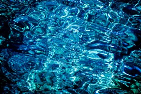 Deep blue liquid water surface. Abstract background Stock Photos