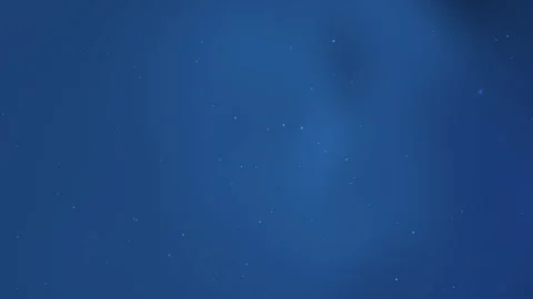Deep Blue Night Sky: A Celestial Canvas of Stars and Subtle Light Video stock 293893659