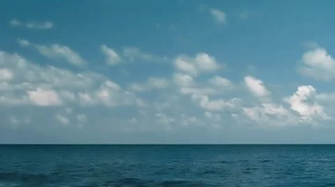 Deep blue ocean with fast clouds time lapse Stock Footage 40659961