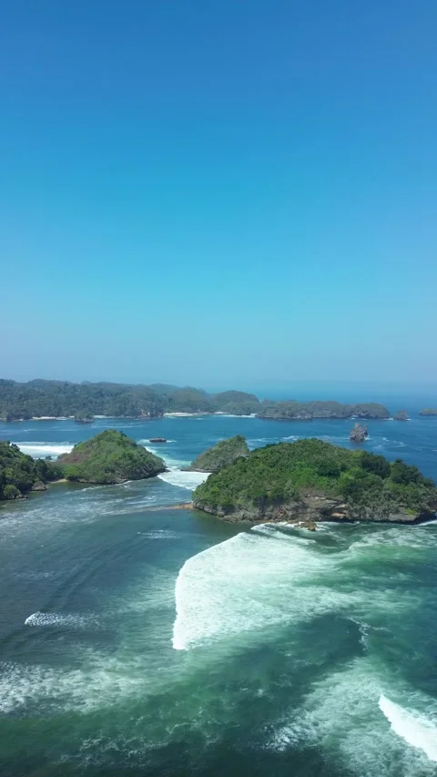 Deep blue ocean at Teluk Asmara Beach vertical shot August 3 2026 Video stock 342135375