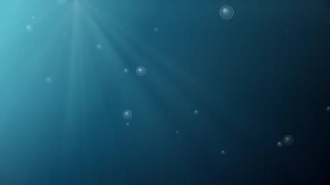 Deep Blue Ocean Water Background with Sunbeams and Rising Air Bubbles Stock Footage 334648488
