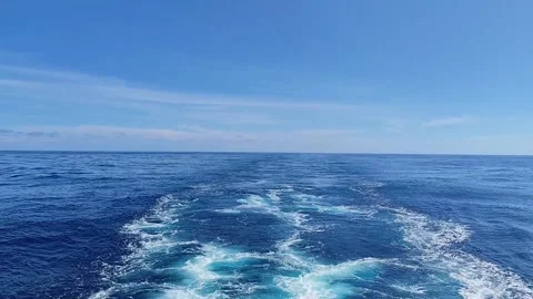 Deep blue ocean water leaving turbulent wake motion footage Stock Footage 344369134