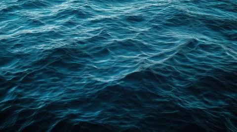 Deep blue ocean water surface with rippling waves creating a calming natural Stock Photos