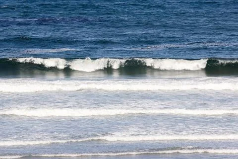 Deep Blue Ocean Waves and Shallow Tides Stock Photos
