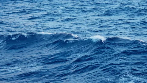 Deep Blue Ocean Waves Rolling Across Open Sea with White Foam Crests. Vídeos de archivo 341990710
