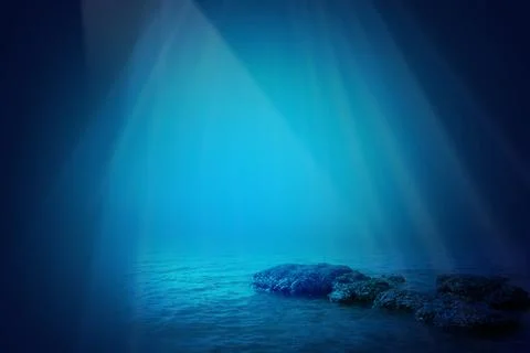 Deep blue sea background with sunlight shining  Stock Photos