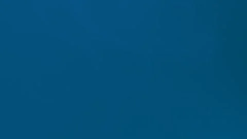 Deep blue seamless loop background with soft gradients. 4K clarity. Video stock 300840544