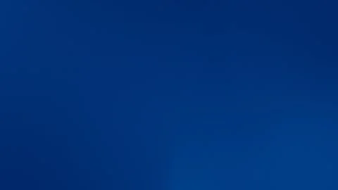 Deep blue seamless loop background, smooth gradient texture, 4K. Vídeo Stock 309700890