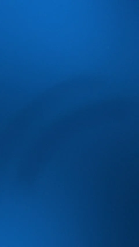 Deep blue seamless loop background with soft shadow curves. 4K texture. Stock Footage 309701488