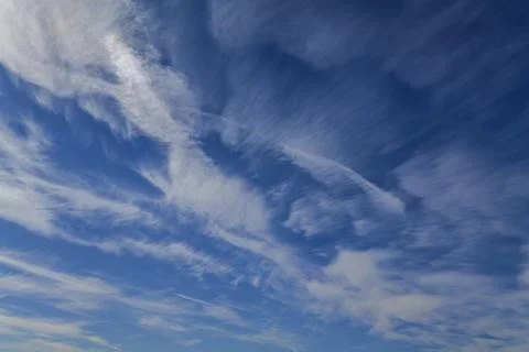 Deep blue skies with white clouds background with space for text, blue cloudy Stock Photos