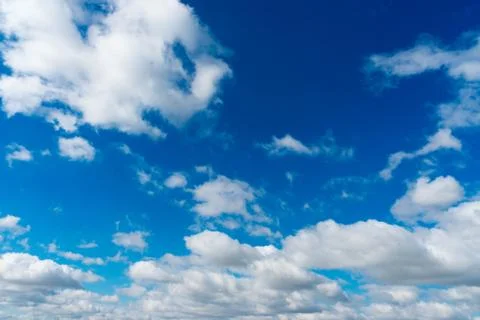 Deep blue sky and clouds, may be used as background Stock Photos